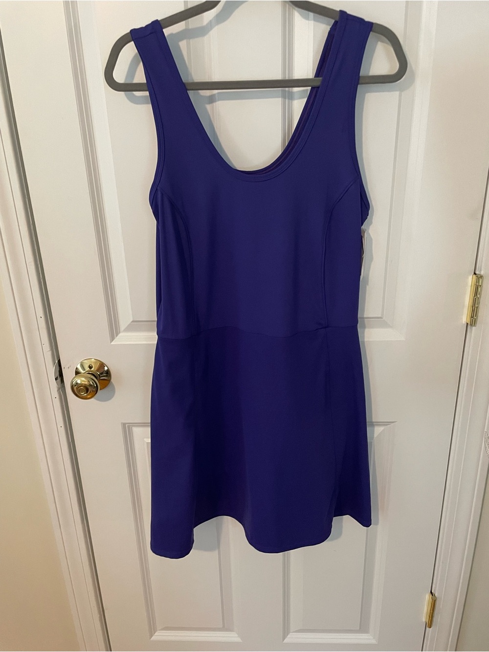 Xersion Sleeveless Mini Dress in Deep Purplew built in shorts